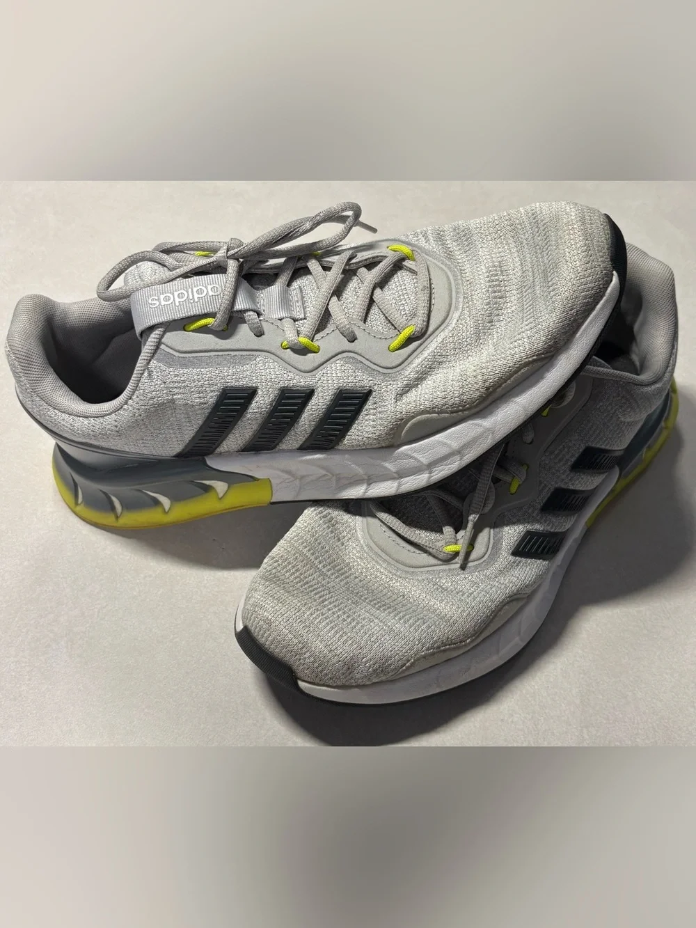 Adidas Men's Kaptir Super running shoes with yellow and black accents